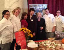 Culinary students pose in a picture with President Terenzio and Senator Kirsten Gillibrand