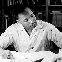 Dr. Martin Luther King Jr working at his desk